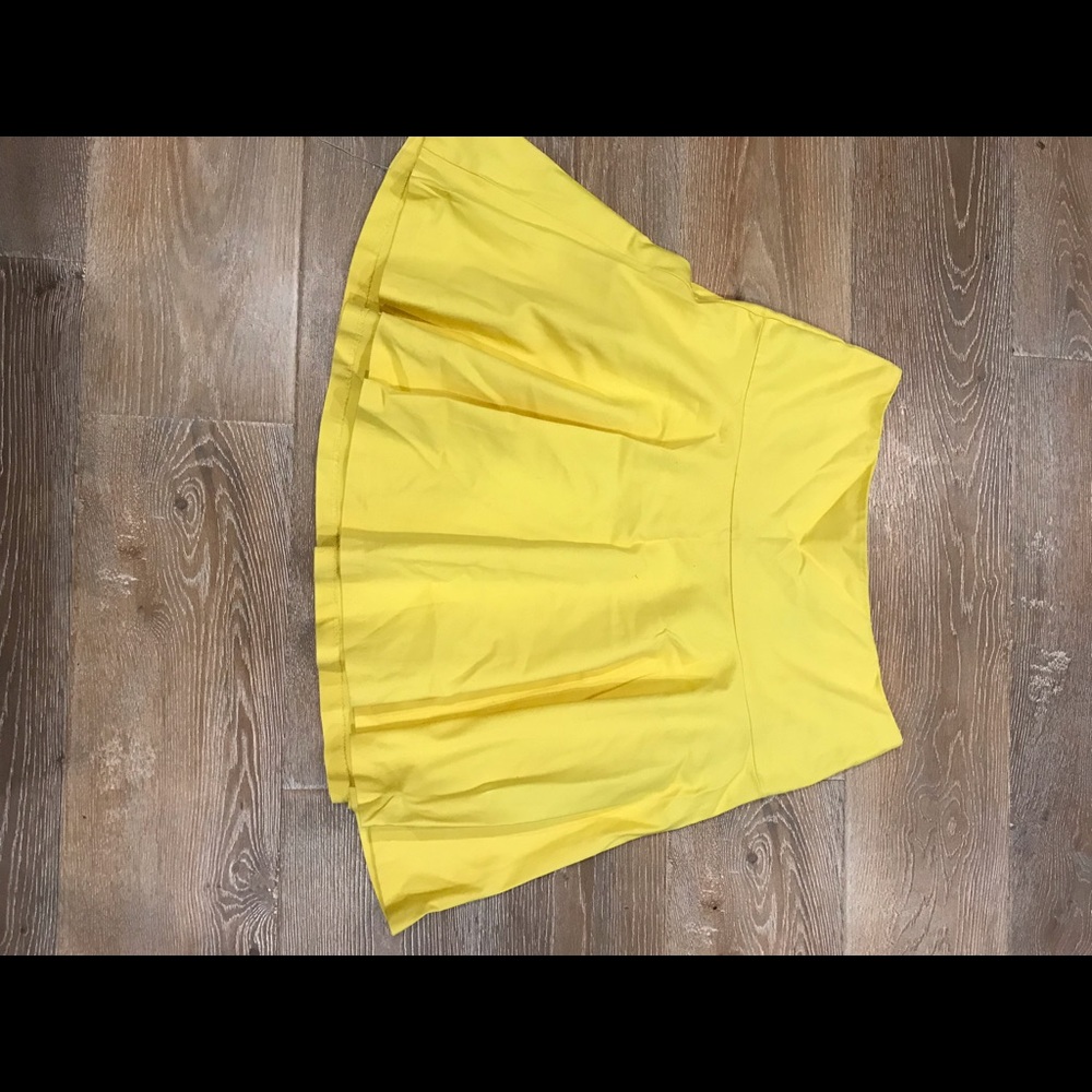Yellow skater skirt.
